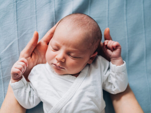 All About the Newborn Scrunch and Its Importance in Your Baby's Development